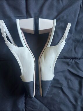 Pointed Two-Tone Slingback Mules in White and Black